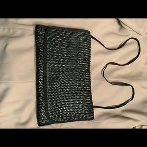 Sleek shoulder purse-basket woven material